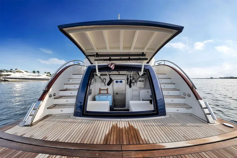 Slide: The Image of Luxury Steeler 60S yacht stern view, showcasing open storage and elegant design, 2021 model. - 50