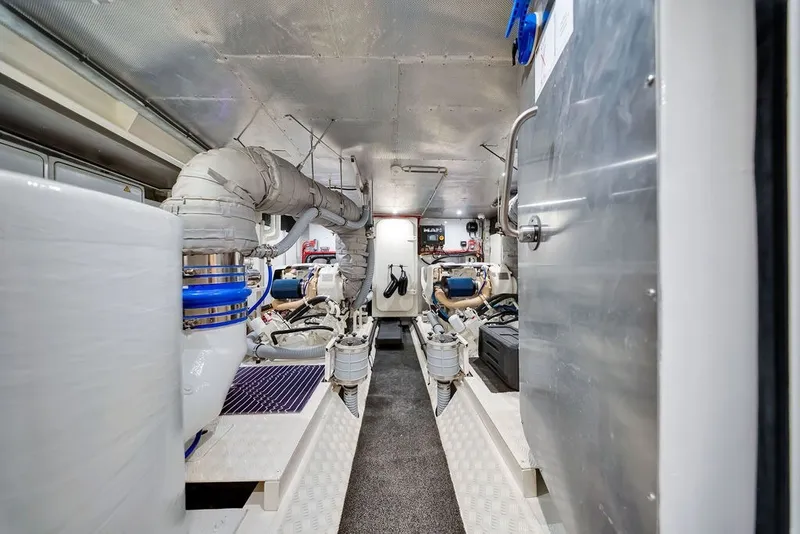 Slide: The Image of Engine room of 2021 Steeler 60S yacht, showcasing advanced machinery and equipment. - 113