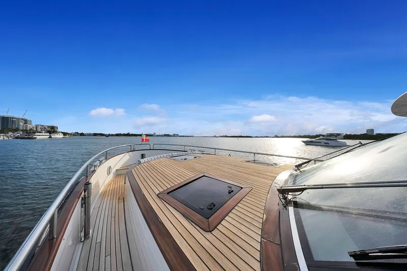 Slide: The Image of Luxurious 2021 Steeler 60S yacht deck with scenic waterfront view. - 62