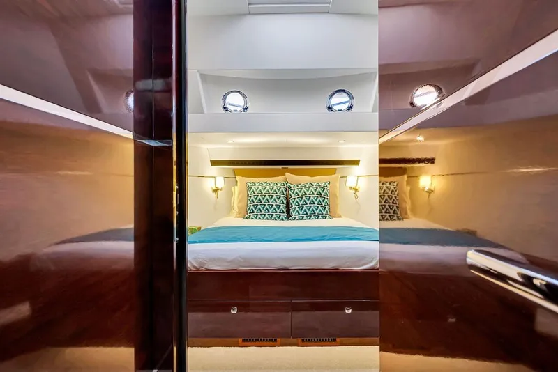 Slide: The Image of Luxurious bedroom interior of 2021 Steeler 60S yacht with elegant bedding and lighting. - 94