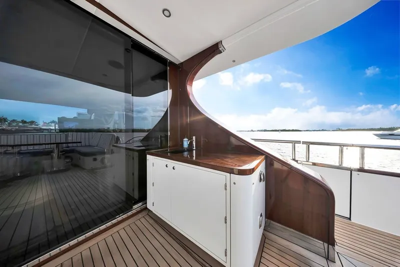 Slide: The Image of Luxurious 2021 Steeler 60S yacht deck with sleek design and ocean view. - 59