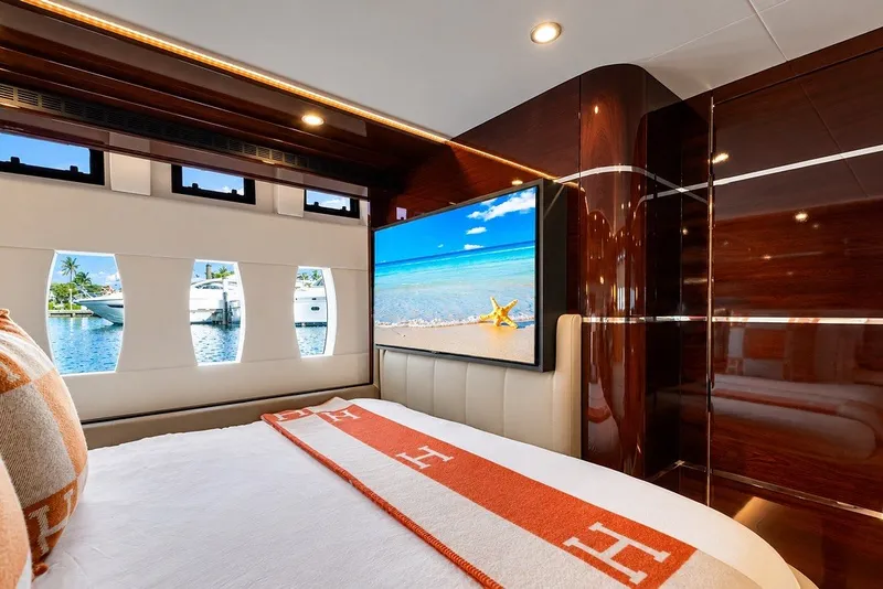 Slide: The Image of Luxurious interior of 2021 Steeler 60S yacht with elegant wood paneling and scenic window views. - 104