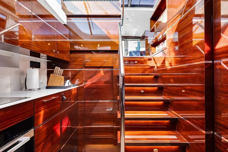Slide: The Image of Luxurious wooden interior of 2021 Steeler 60S yacht with modern kitchen and staircase. - 85