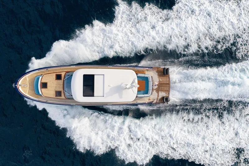 Slide: The Image of Aerial view of 2021 Steeler 60S yacht cruising through ocean waves. - 17