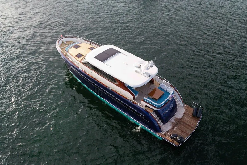 Slide: The Image of Aerial view of 2021 Steeler 60S yacht cruising on open water. - 42