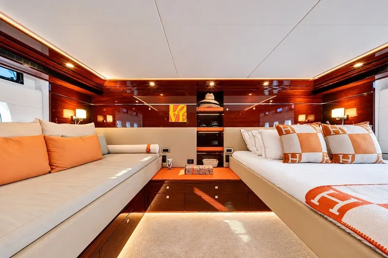 Slide: The Image of Luxurious interior of 2021 Steeler 60S yacht with elegant wood finishes and cozy bedding. - 103