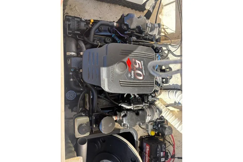Slide: The Image of Engine of 2002 Rinker 212 Captiva Bowrider, featuring MerCruiser 5.0 MPI. - 14