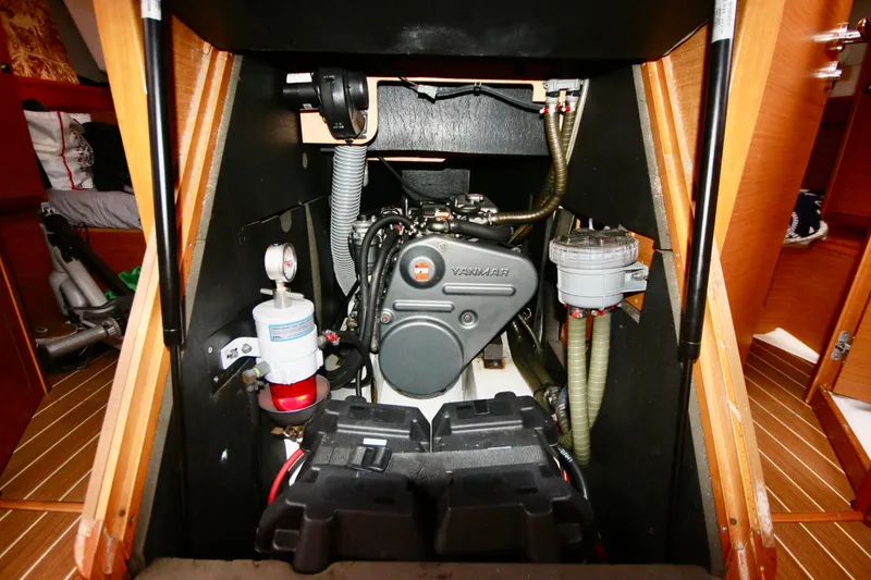 Slide: The Image of Engine compartment of 2012 Jeanneau Sun Odyssey 509 sailboat, featuring Yanmar engine. - 18