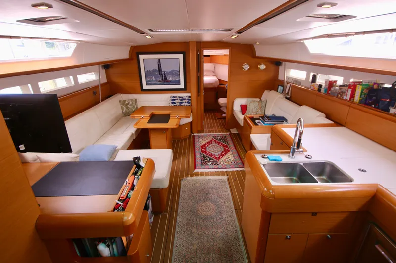 Slide: The Image of Luxurious interior of 2012 Jeanneau Sun Odyssey 509 yacht with modern furnishings and spacious layout. - 1