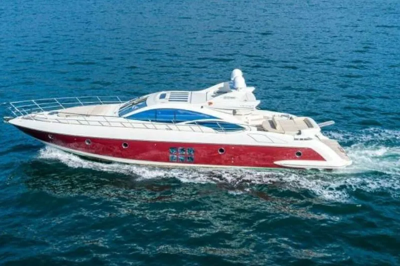 The Image of 2009 Azimut 68S yacht cruising on open water, showcasing sleek design and luxury. - 0