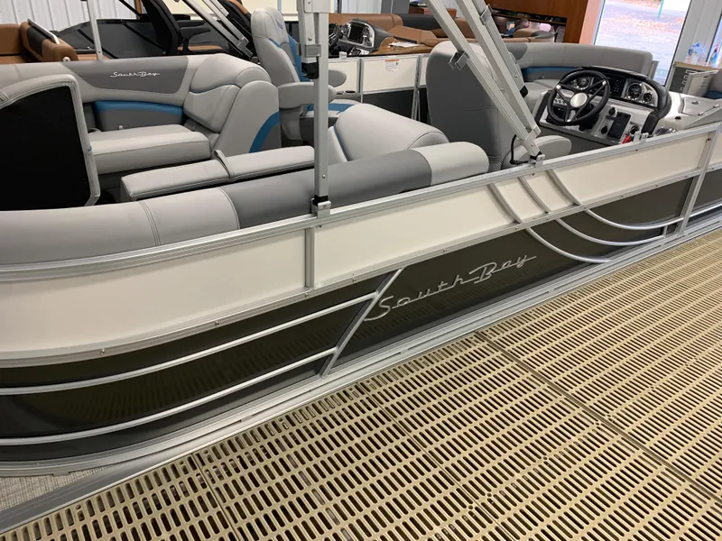 Slide: The Image of 2023 South Bay S224 RS pontoon boat with luxurious seating and modern design. - 4