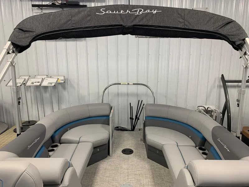 Slide: The Image of 2023 South Bay S224 RS pontoon boat with gray and blue seating. - 30
