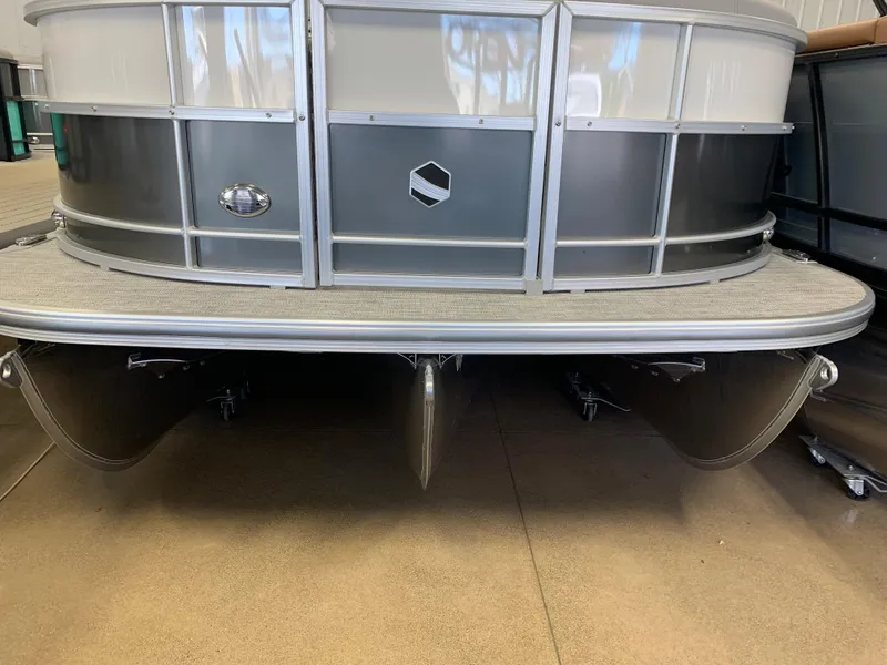Slide: The Image of 2023 South Bay S224 RS pontoon boat front view in showroom. - 35