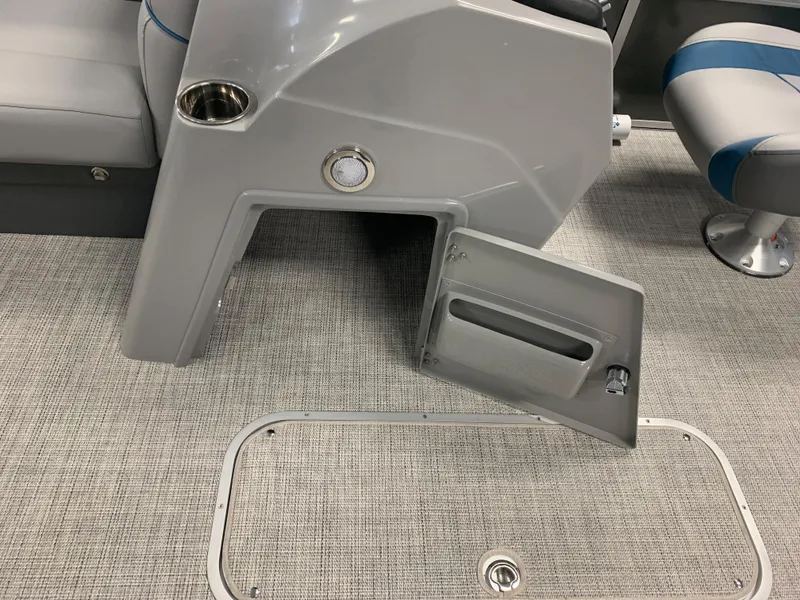Slide: The Image of 2023 South Bay S224 RS boat interior storage compartment and seating. - 21