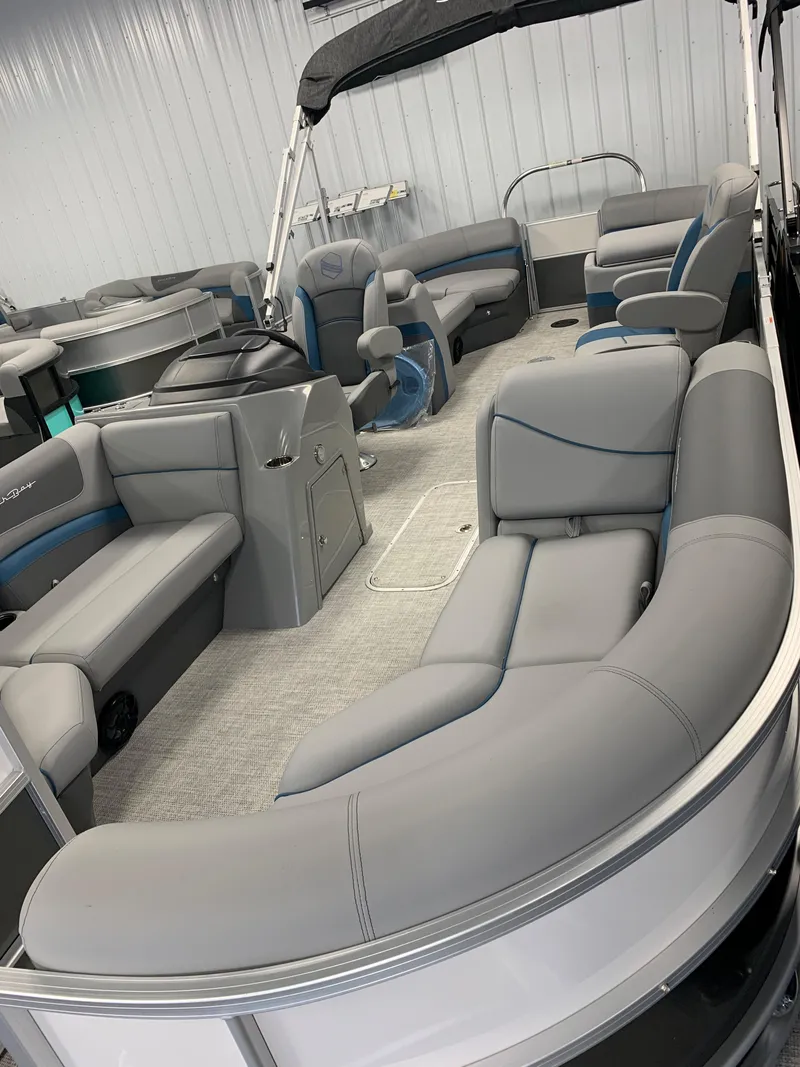 Slide: The Image of 2023 South Bay S224 RS pontoon boat with spacious seating and modern interior. - 33