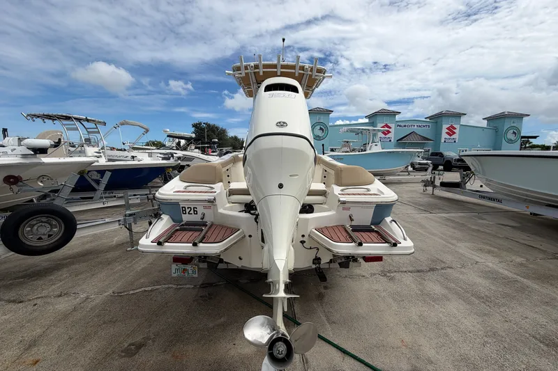 Slide: The Image of 2020 Pioneer 202 Islander boat at Palm City Yachts dealership, rear view. - 4