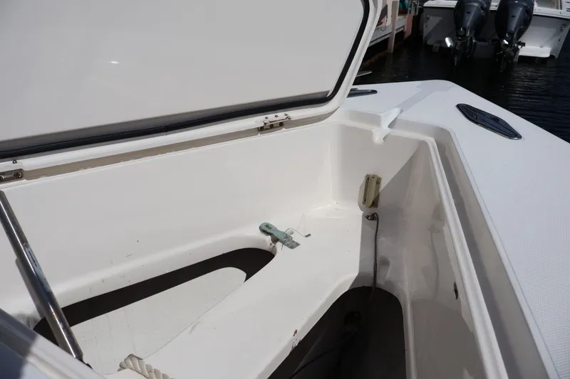 Slide: The Image of Open storage compartment on a 2006 Jupiter 38 HFS boat, showcasing interior details. - 37