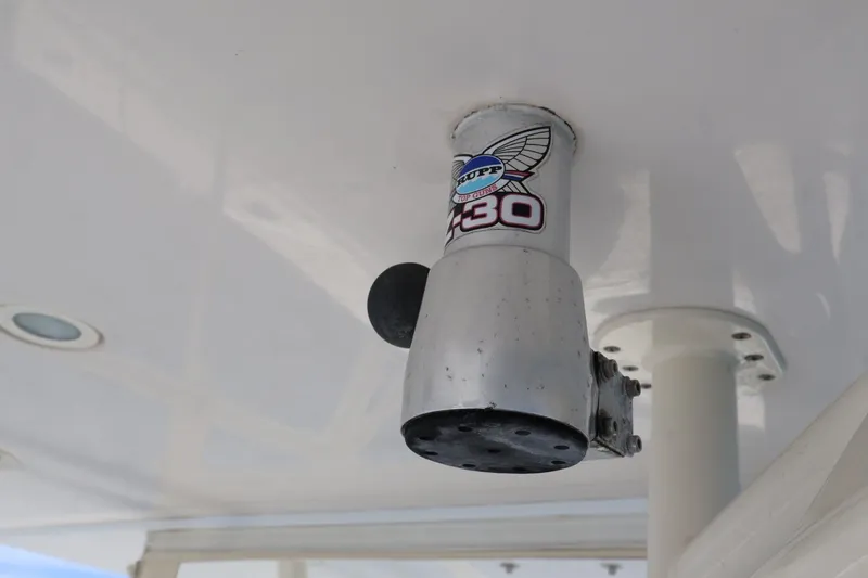 Slide: The Image of Outrigger mount on 2006 Jupiter 38 HFS boat, featuring a Rupp Z-30 model. - 40