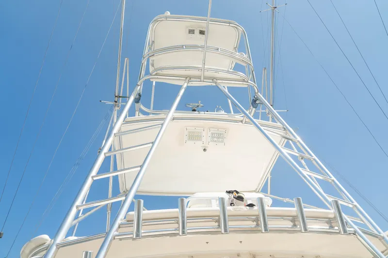 Slide: The Image of 2009 Cabo 40 Express boat tower against clear blue sky. - 27