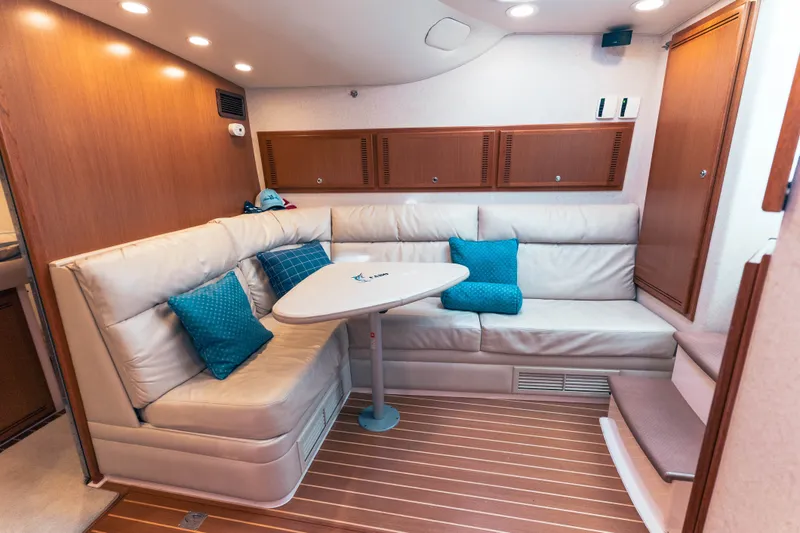 Slide: The Image of Luxurious interior of 2009 Cabo 40 Express yacht with plush seating and elegant decor. - 28