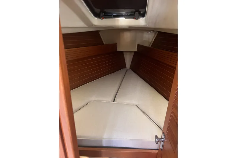 Slide: The Image of Interior cabin of 1989 C&C 30 MKII sailboat with cushioned V-berth. - 80