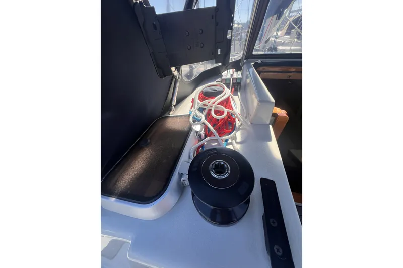 Slide: The Image of Cockpit view of 1989 C&C 30 MKII sailboat with ropes and winch. - 18