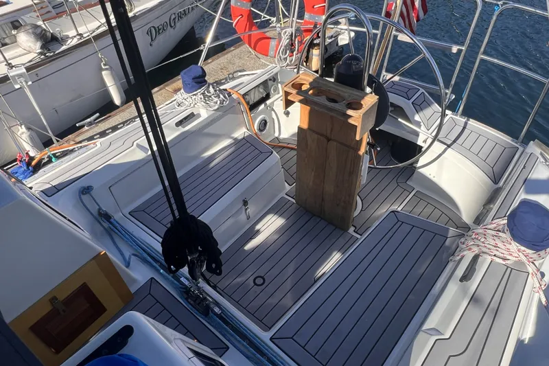 Slide: The Image of Cockpit of a 1989 C&C 30 MKII sailboat with wooden accents and steering wheel. - 22