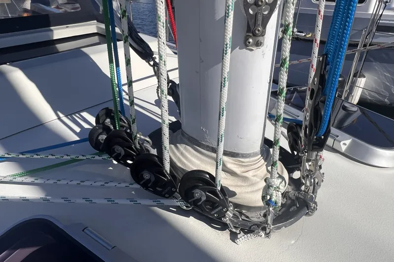 Slide: The Image of Rigging and pulleys on a 1989 C&C 30 MKII sailboat mast. - 13