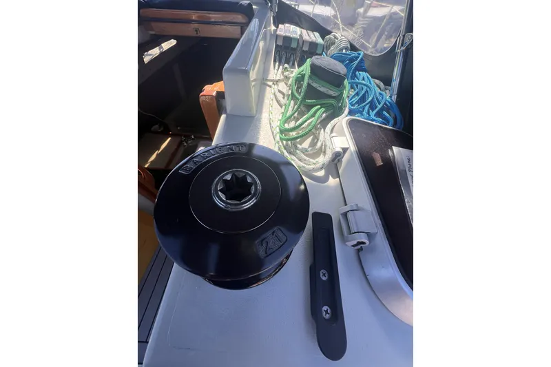 Slide: The Image of Winch and ropes on 1989 C&C 30 MKII sailboat deck. - 21