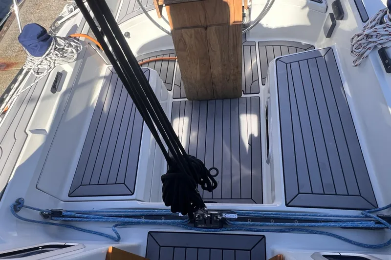 Slide: The Image of Cockpit of 1989 C&C 30 MKII sailboat with teak flooring and rigging ropes. - 23