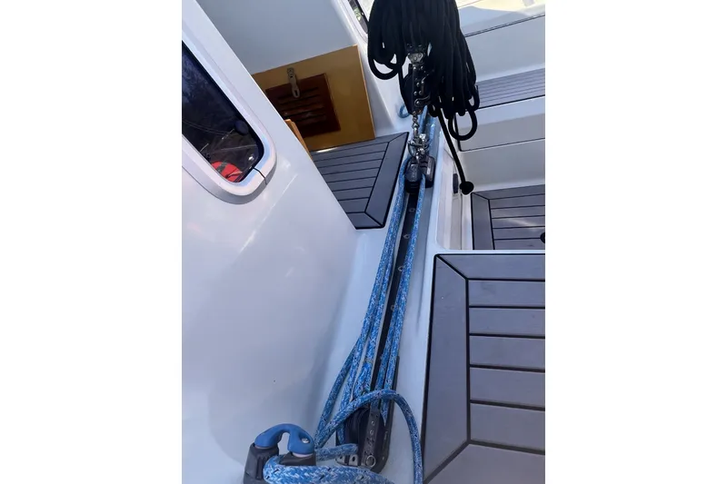 Slide: The Image of Cockpit view of 1989 C&C 30 MKII sailboat with ropes and seating. - 27