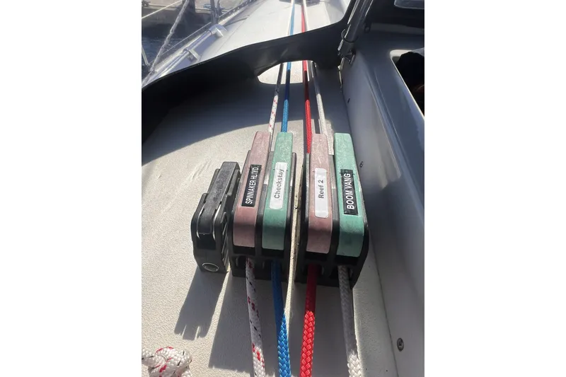 Slide: The Image of Control lines on a 1989 C&C 30 MKII sailboat deck, labeled for easy identification. - 19