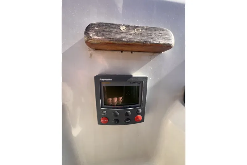 Slide: The Image of Raymarine autopilot control on 1989 C&C 30 MKII sailboat dashboard. - 36