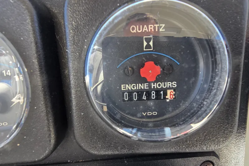 Slide: The Image of Close-up of a 1989 Silverton 34 Convertible engine hour meter showing 481.6 hours. - 14