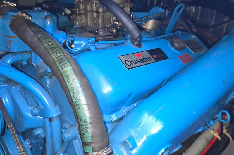 Slide: The Image of Blue Crusader engine in a 1989 Silverton 34 Convertible boat. - 34