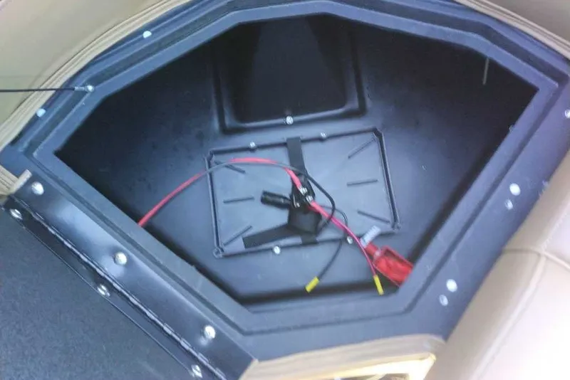 Slide: The Image of Storage compartment in 2027 Ranger 223FC boat with wiring components. - 4