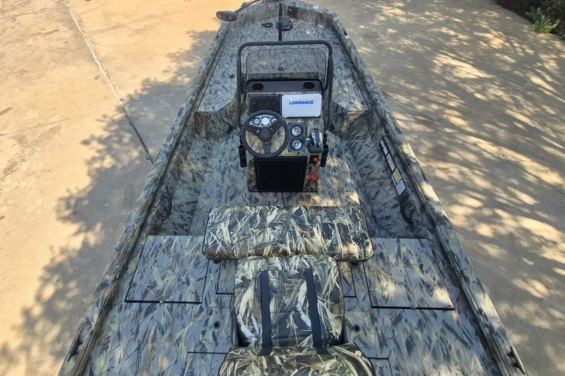 Slide: The Image of 2027 Ranger RB190 boat with camouflage design and advanced navigation system. - 9