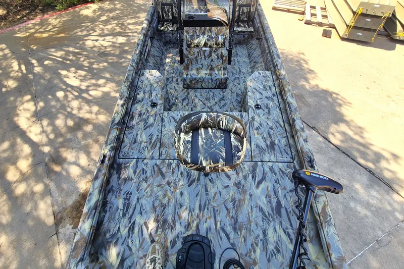 Slide: The Image of 2027 Ranger RB190 boat with camouflage design, featuring a Minn Kota trolling motor. - 12