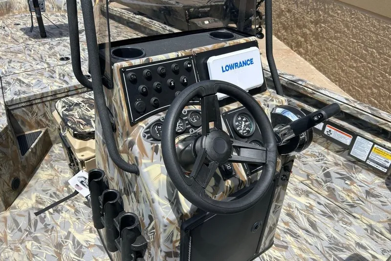 Slide: The Image of Control panel of 2027 Ranger RB200 boat with camo design and Lowrance display. - 6