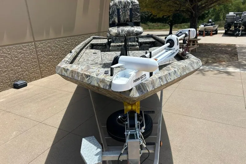 Slide: The Image of 2027 Ranger RB200 boat with camouflage design and Minn Kota trolling motor. - 12