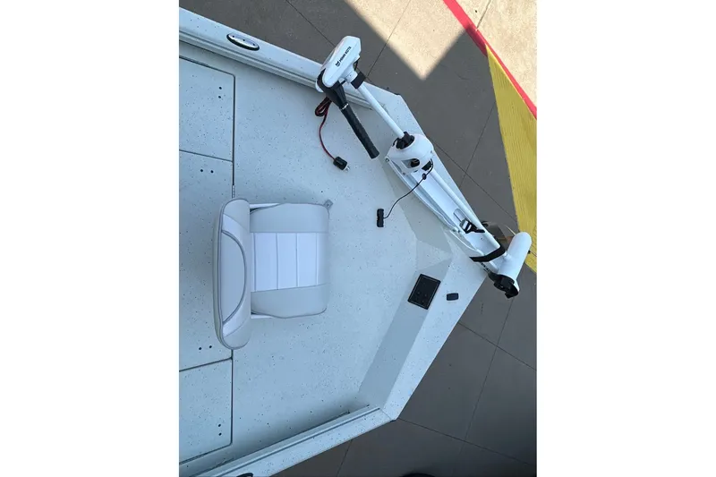 Slide: The Image of 2027 Ranger RB190 boat deck with seat and trolling motor. - 10