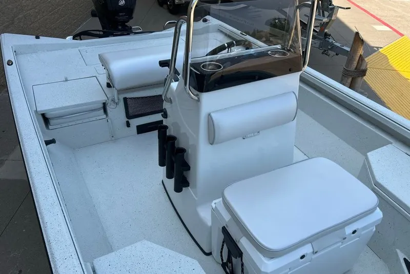 Slide: The Image of 2027 Ranger RB190 boat interior with seating and console, showcasing modern design and functionality. - 14