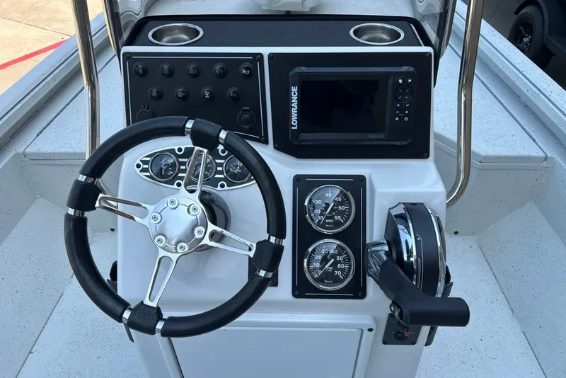 Slide: The Image of Steering console of 2027 Ranger RB190 boat with gauges and navigation system. - 9