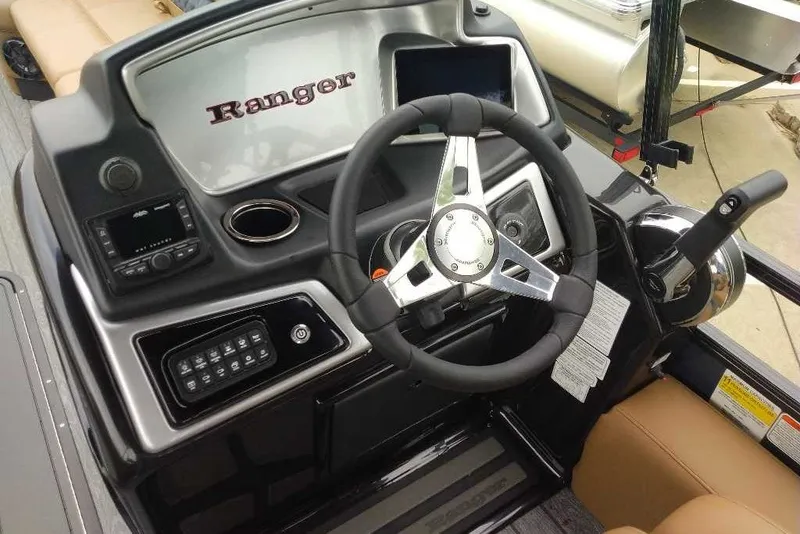 Slide: The Image of Steering console of 2027 Ranger 223FC boat with modern controls and dashboard. - 3