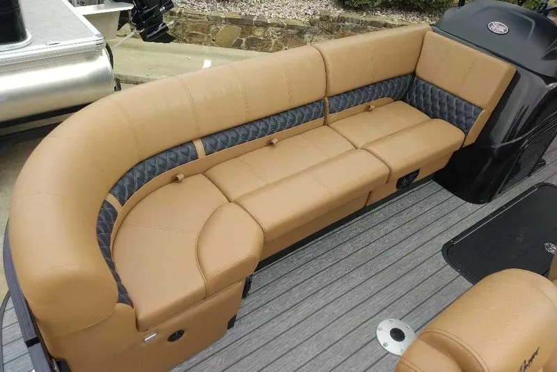 Slide: The Image of Luxurious tan seating on 2027 Ranger 223FC boat, featuring quilted accents and modern design. - 7