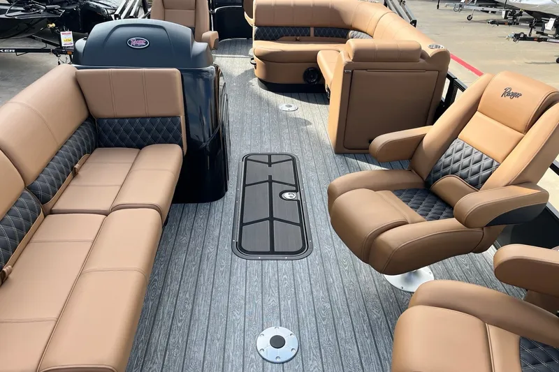 Slide: The Image of Luxurious interior of 2027 Ranger 223FC boat with tan leather seating and modern design. - 4