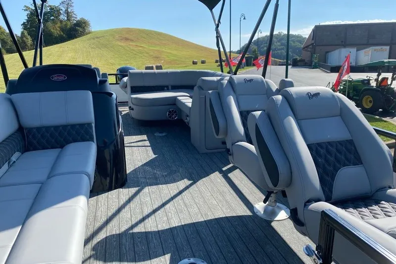 Slide: The Image of 2027 Ranger 220FC boat interior with luxurious seating and modern design. - 4