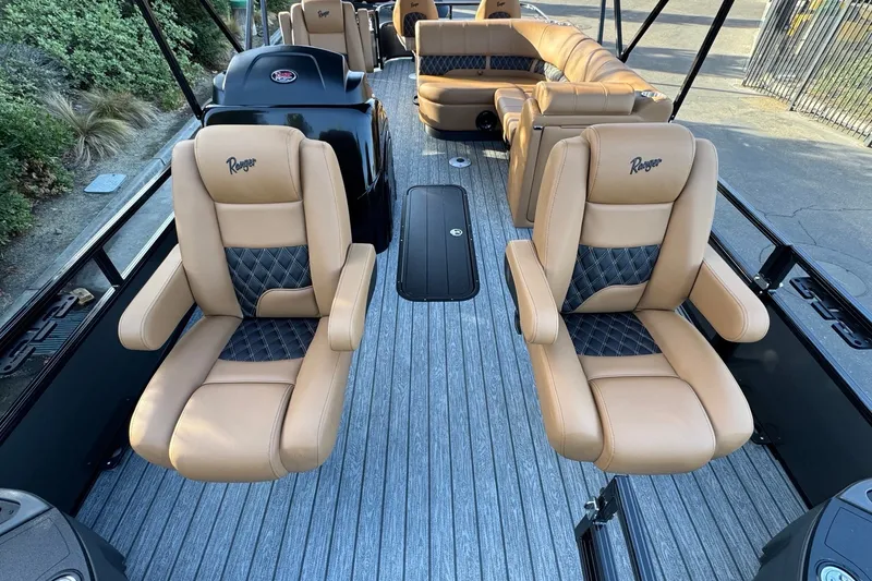Slide: The Image of Luxurious interior of 2027 Ranger 223F boat with tan leather seating and modern design. - 8