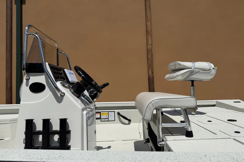 Slide: The Image of 2027 Ranger RB200 boat interior with steering console and seating, showcasing modern design. - 7