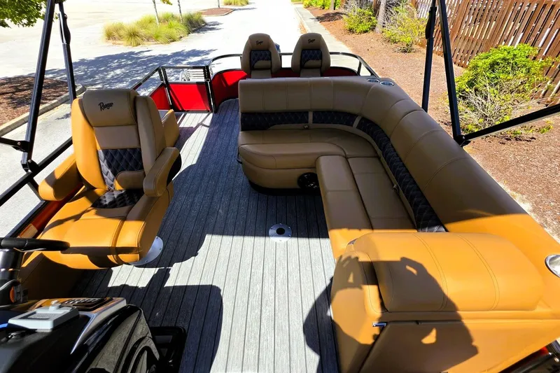 Slide: The Image of Pontoon boat interior with tan leather seating, Ranger 223FC model, 2027. - 17